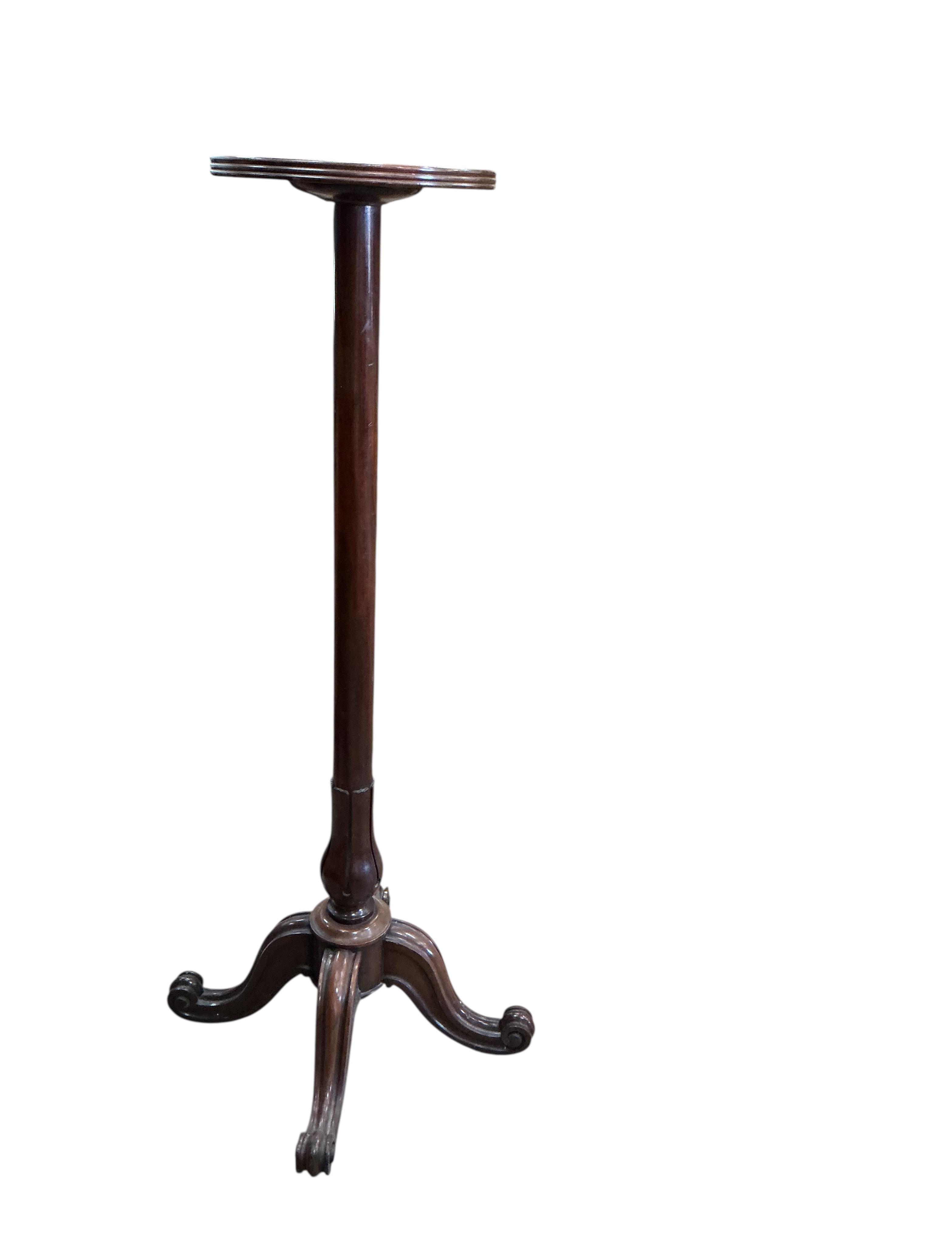 A Victorian mahogany torchere, height 139cm together with a later oak standard lamp